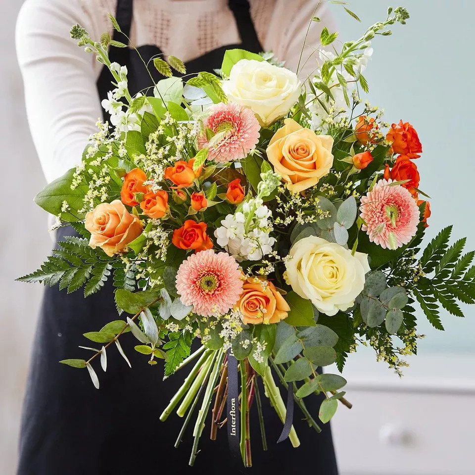 Hand-tied bouquet made with beautiful fresh flowers